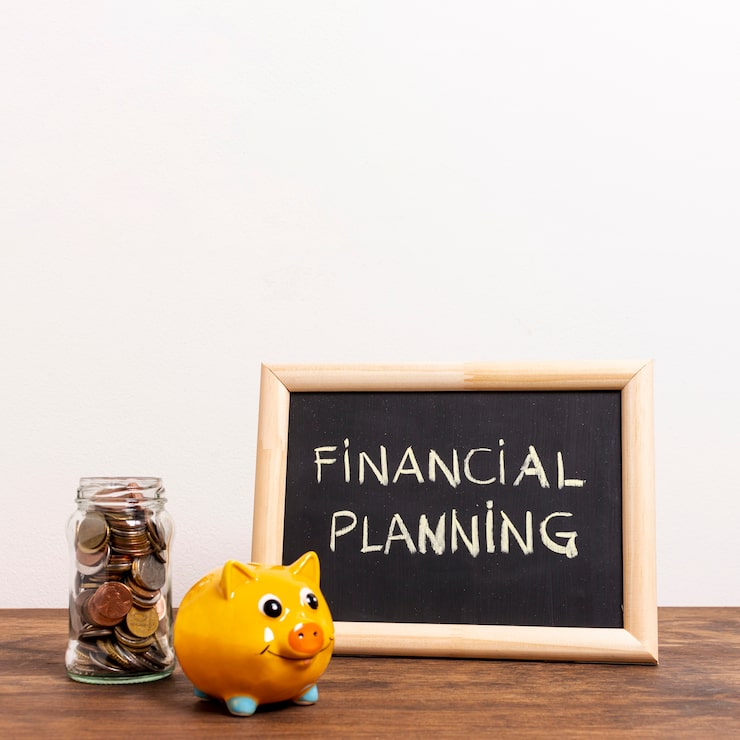 Chalkboard with financial planning and money management text